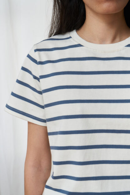 blue and white striped Tshirt close-up of the fabric and ribbed collar.
