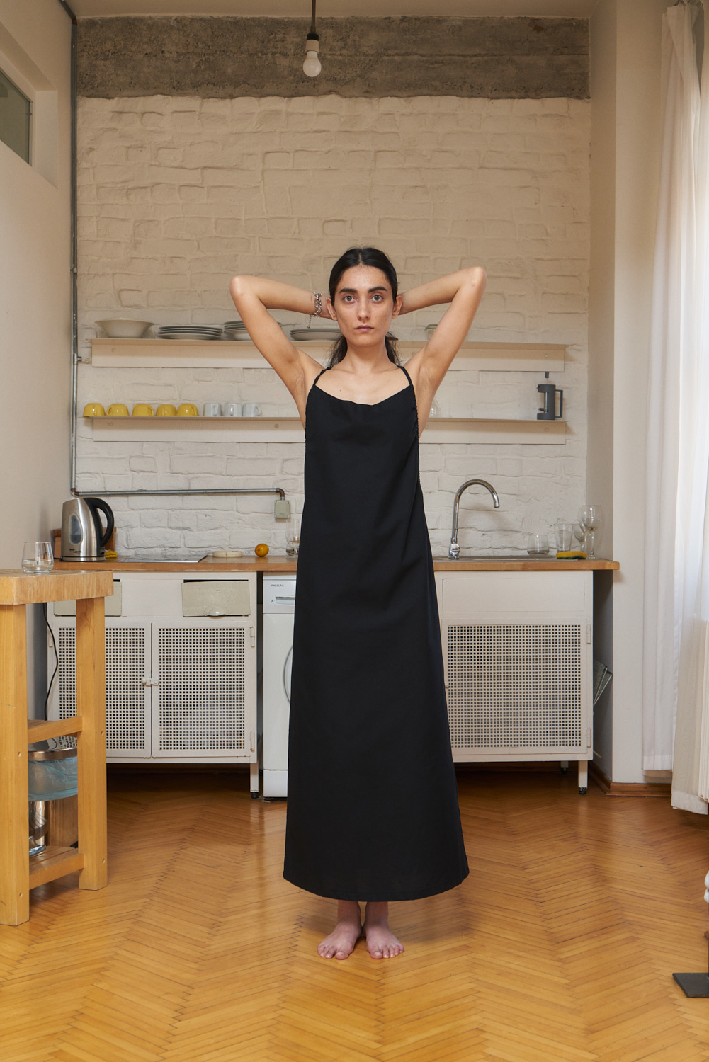 eba halter dress black, organic cotton poplin dress. Mid-calf length and adjustable straps.